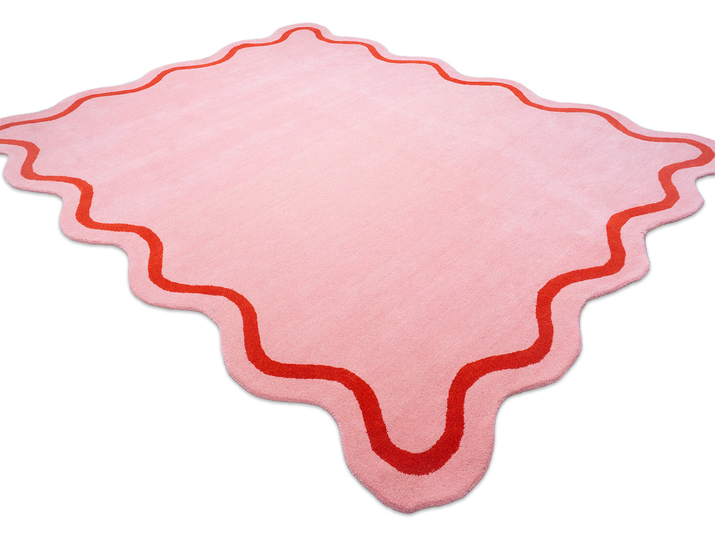 Pink rug with red border 
