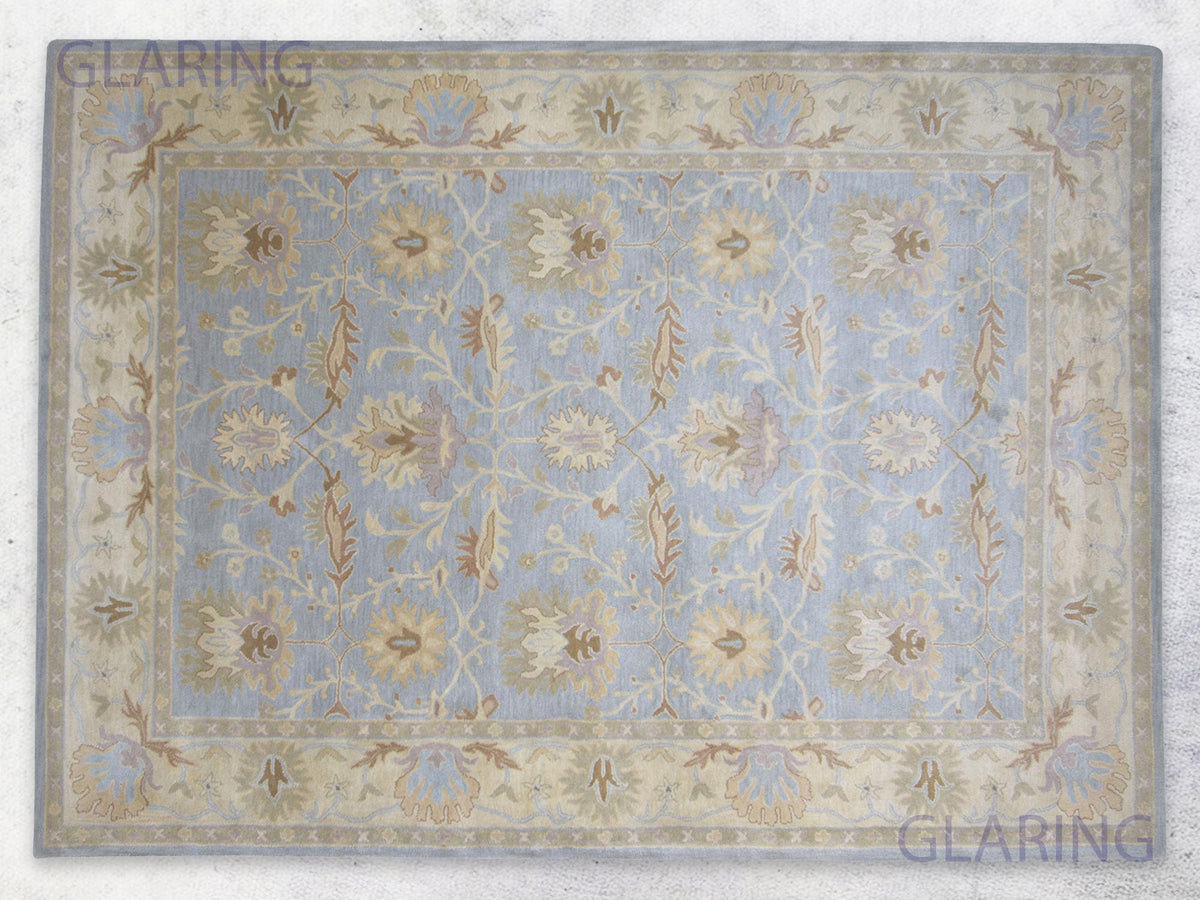 Handmade Sky Blue and Ivory Wool Area Rug with Traditional Floral Pattern