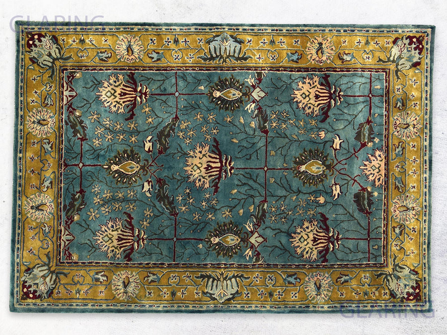 Traditional teal blue rug Persian design in teal blue, gold, green and red color