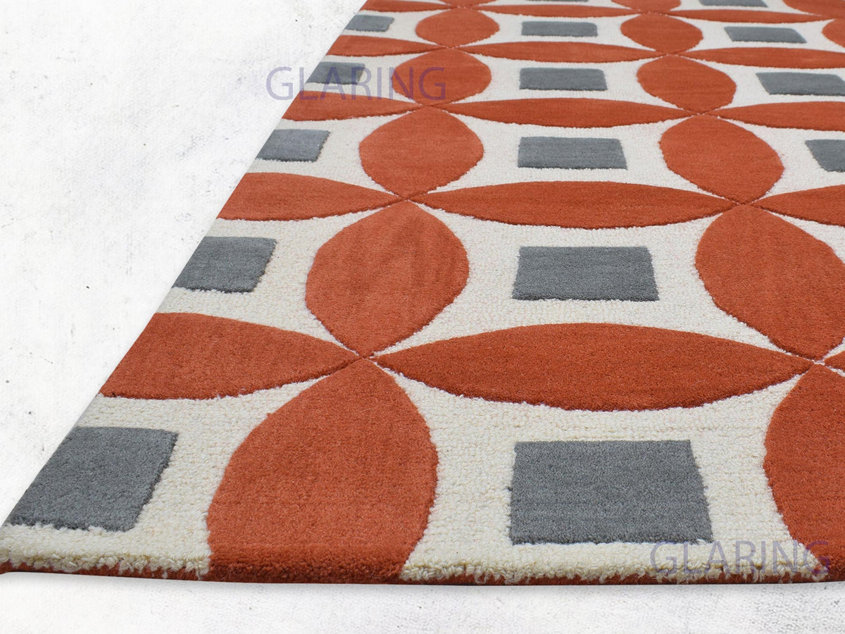 Contemporary orange and grey patterned rug for living room