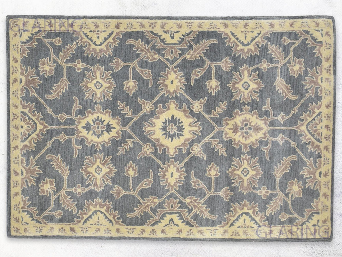 Grey traditional floral area rug with ivory border
