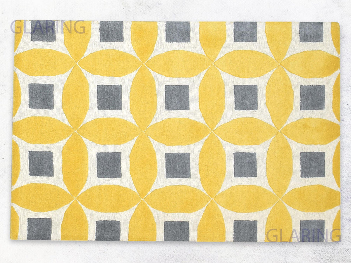 Yellow geometric area rug with grey abstract pattern